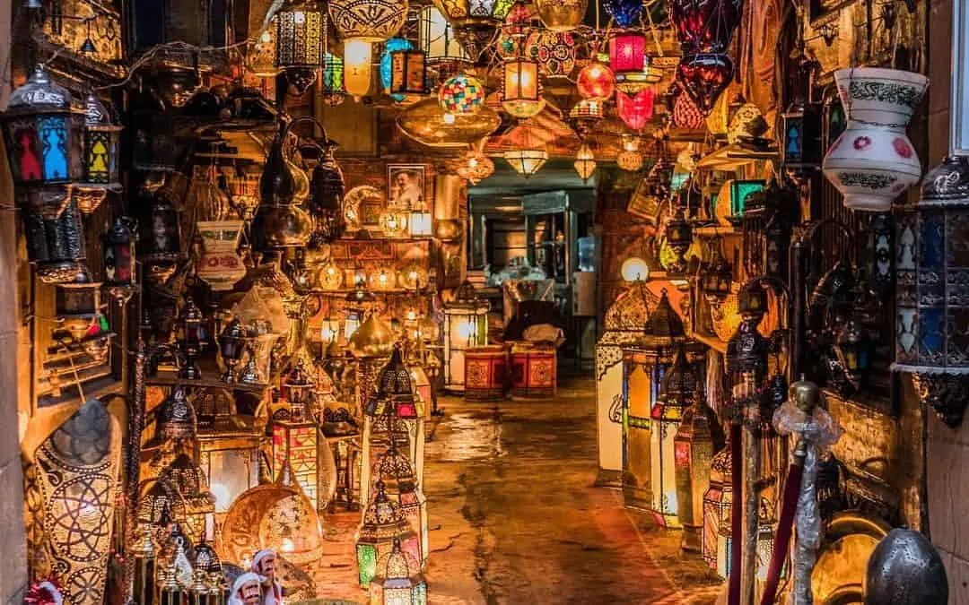 Ornate metal and glass lanterns illuminate the warm, narrow passageways of Sharm El-Sheikh's Old Market.