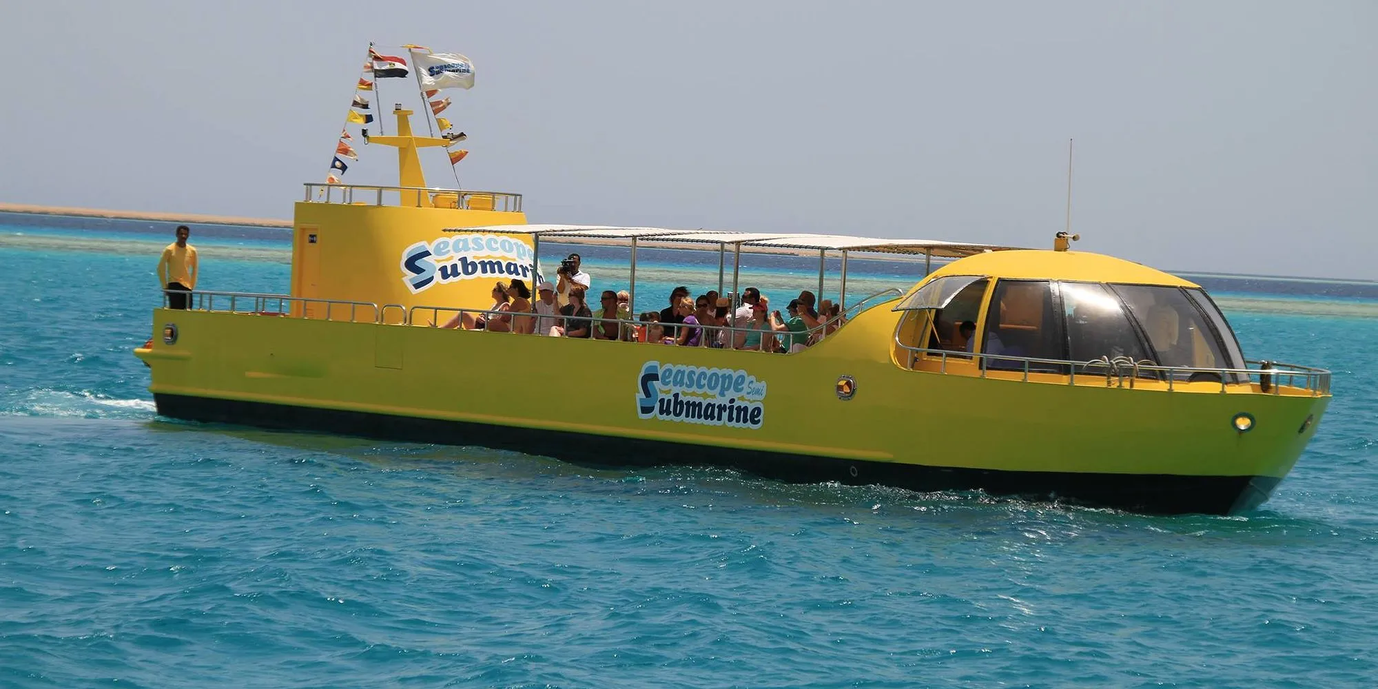 Seascope yellow semi-submarine tour viewing vibrant Red Sea coral reefs in Sharm el-Sheikh.