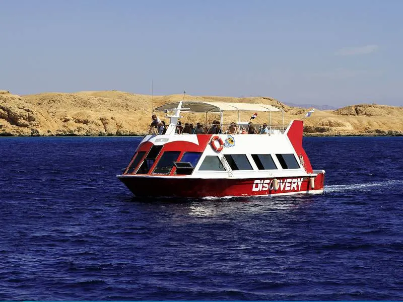 Glass-bottom boat 'DISCOVERY 1' touring Red Sea reefs near Sharm El Sheikh.
