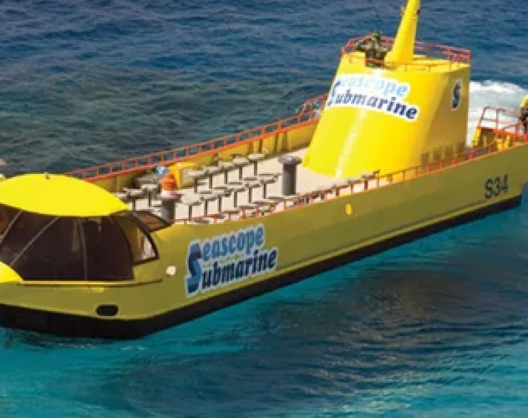 Yellow Seascope semi-submarine over clear blue water, viewing Sharm el-Sheikh coral reefs.